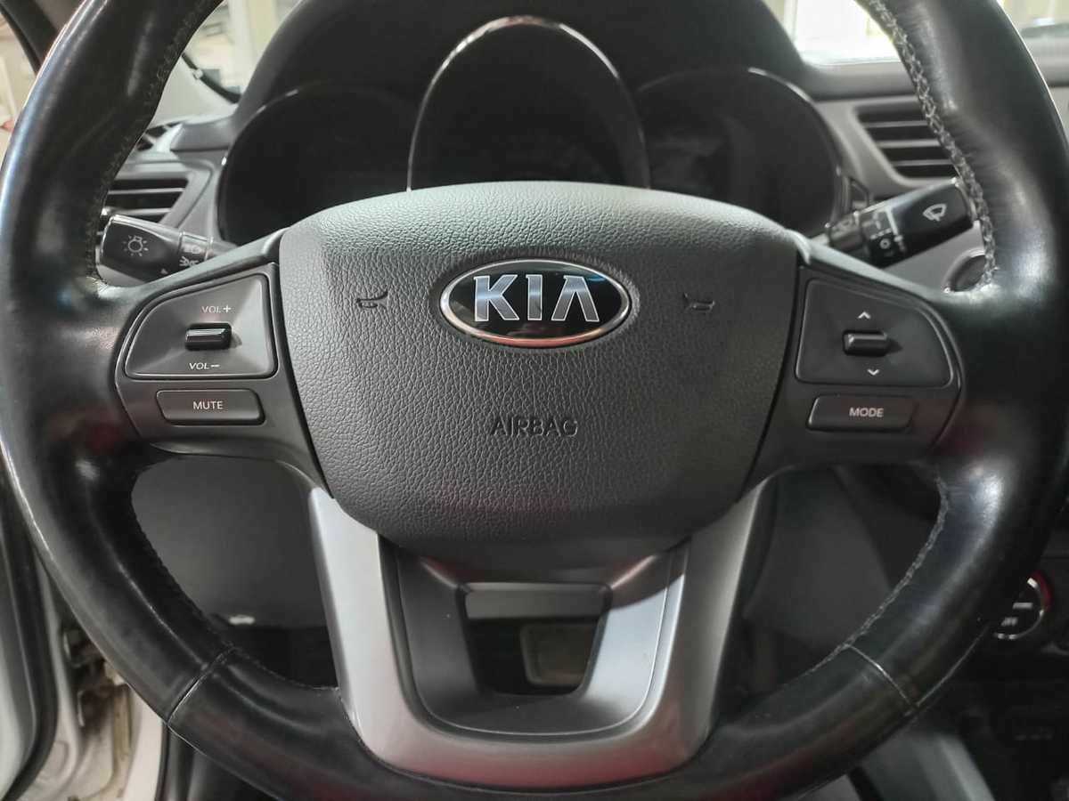 Kia Rio с пробегом — 2013 год. Фото: #13