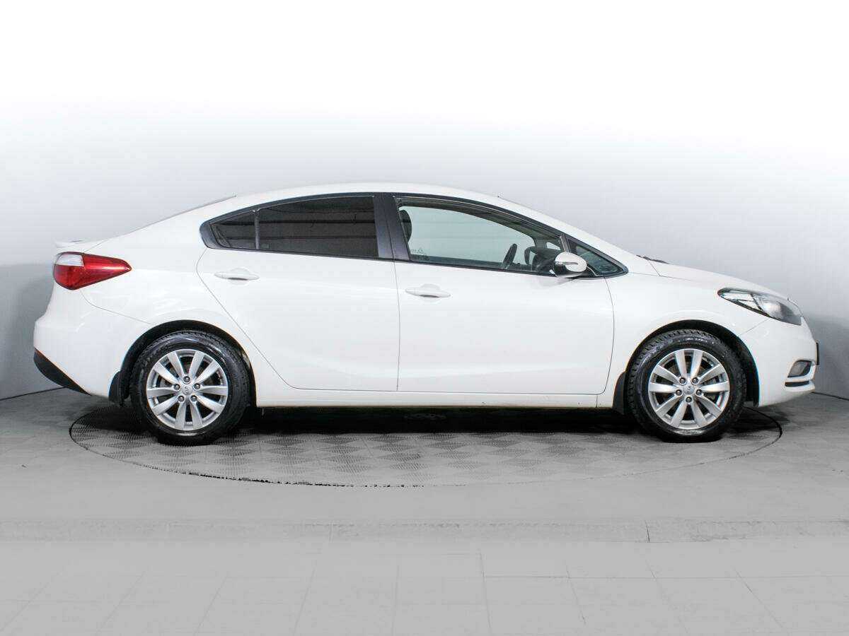 Kia Cerato с пробегом — 2015 год. Фото: #3
