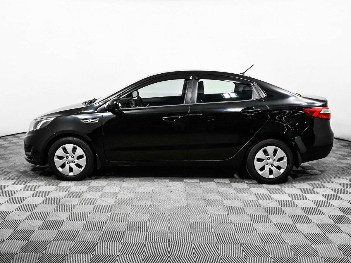 Kia Rio с пробегом — 2011 год. Фото: #7