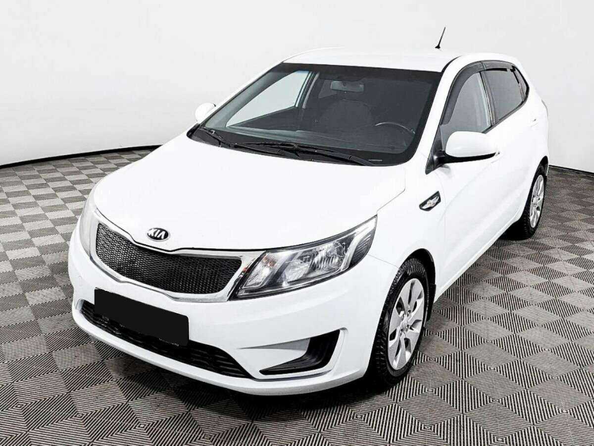 Kia Rio с пробегом — 2014 год. Фото: #0