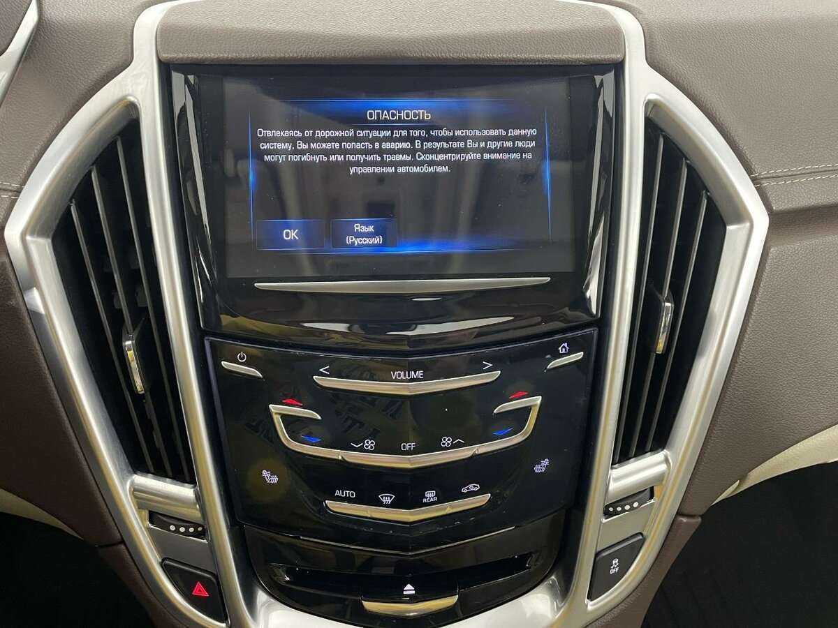 Cadillac SRX с пробегом — 2014 год. Фото: #11