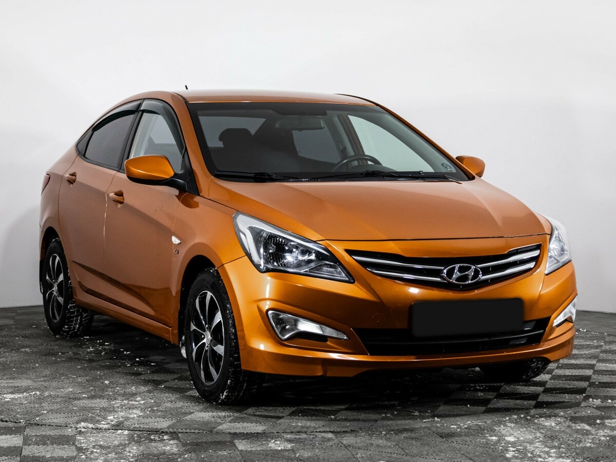 Hyundai Solaris с пробегом — 2014 год. Фото: #2