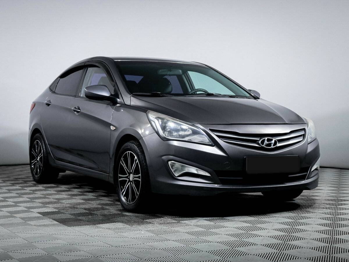 Hyundai Solaris с пробегом — 2014 год. Фото: #2