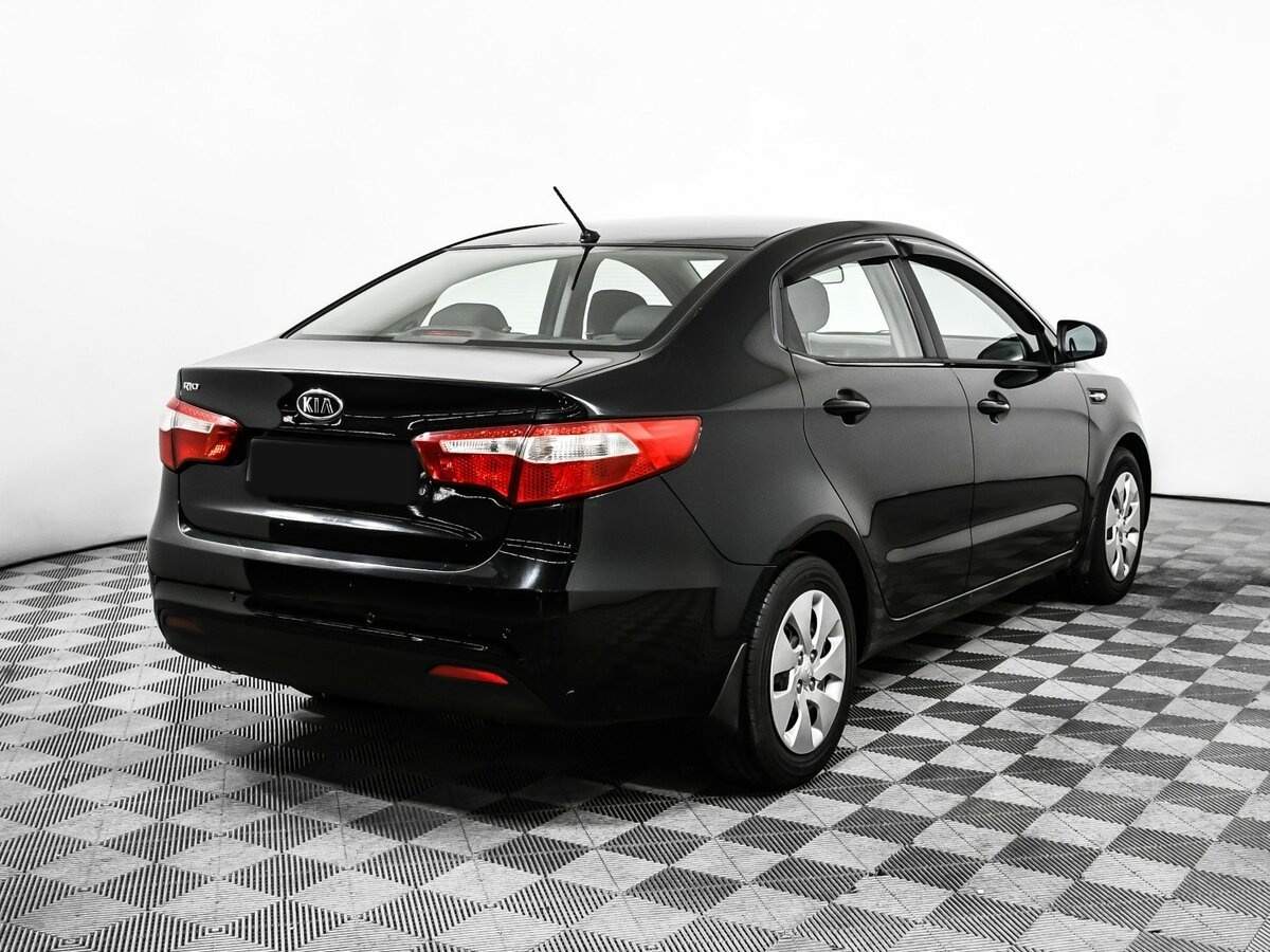 Kia Rio с пробегом — 2011 год. Фото: #4
