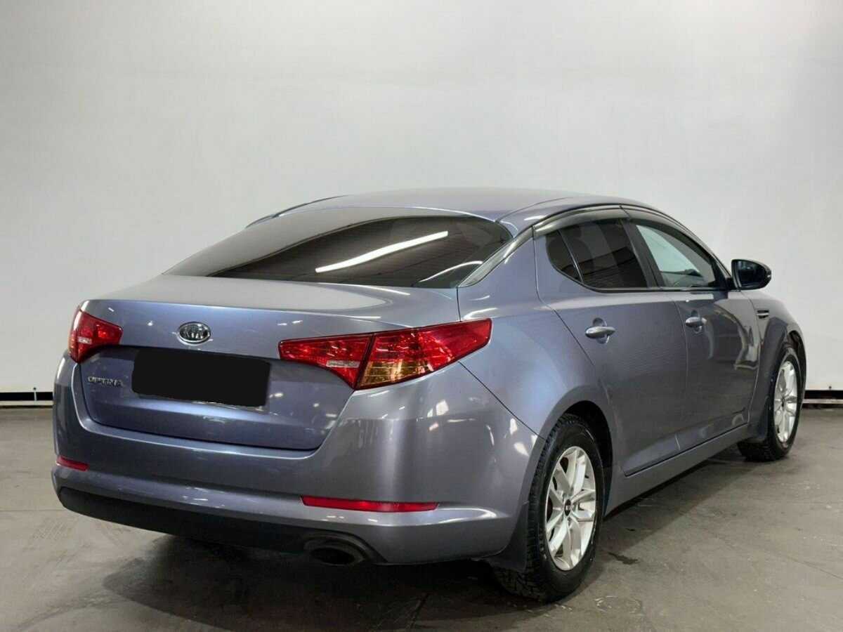 Kia Optima с пробегом — 2011 год. Фото: #4
