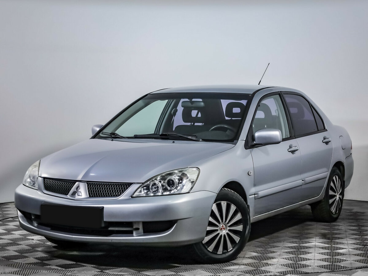 Mitsubishi Lancer с пробегом — 2006 год. Фото: #0