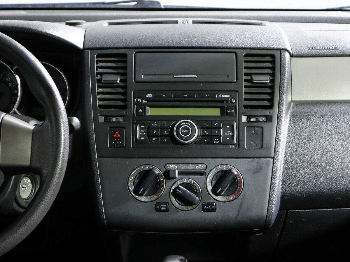 Nissan Tiida с пробегом — 2010 год. Фото: #10