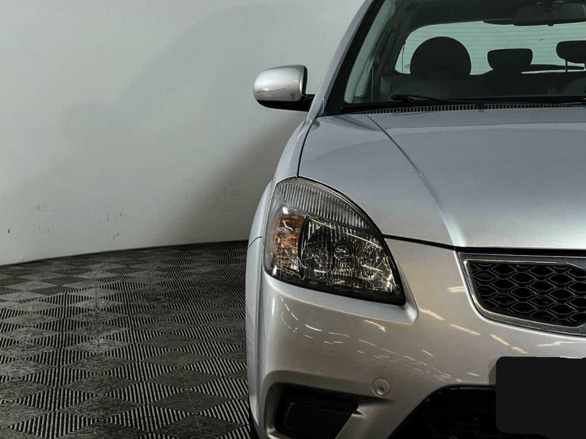 Kia Rio с пробегом — 2011 год. Фото: #10