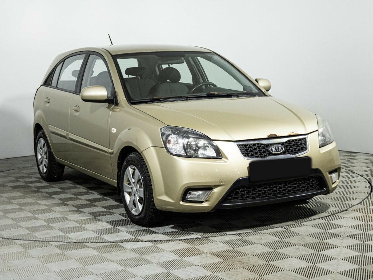 Kia Rio с пробегом — 2011 год. Фото: #2