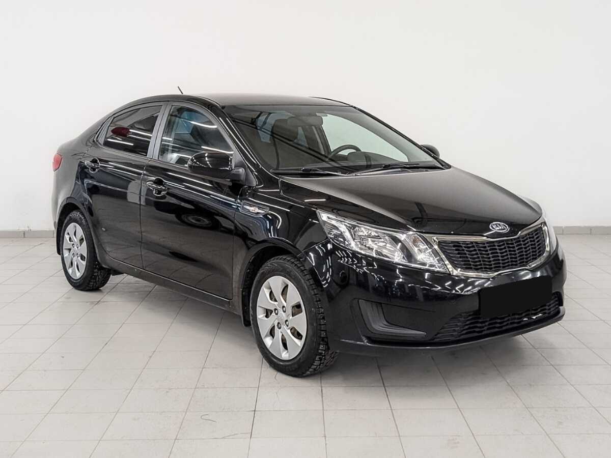 Kia Rio с пробегом — 2012 год. Фото: #2