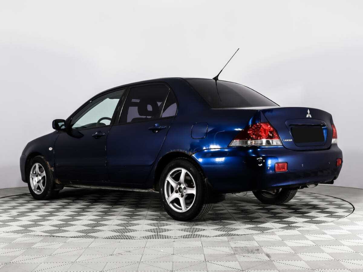 Mitsubishi Lancer с пробегом — 2004 год. Фото: #6
