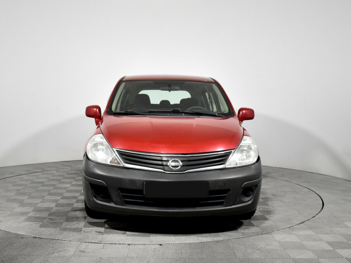 Nissan Tiida с пробегом — 2010 год. Фото: #1