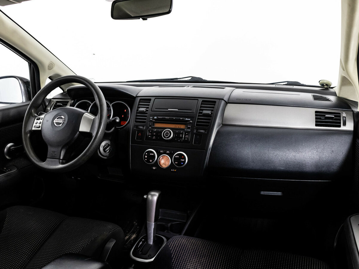 Nissan Tiida с пробегом — 2010 год. Фото: #6