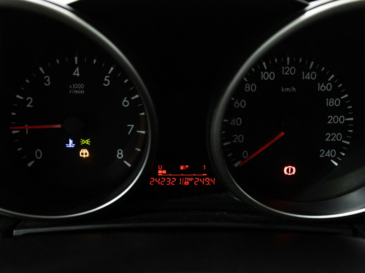 Mazda 3 с пробегом — 2010 год. Фото: #11