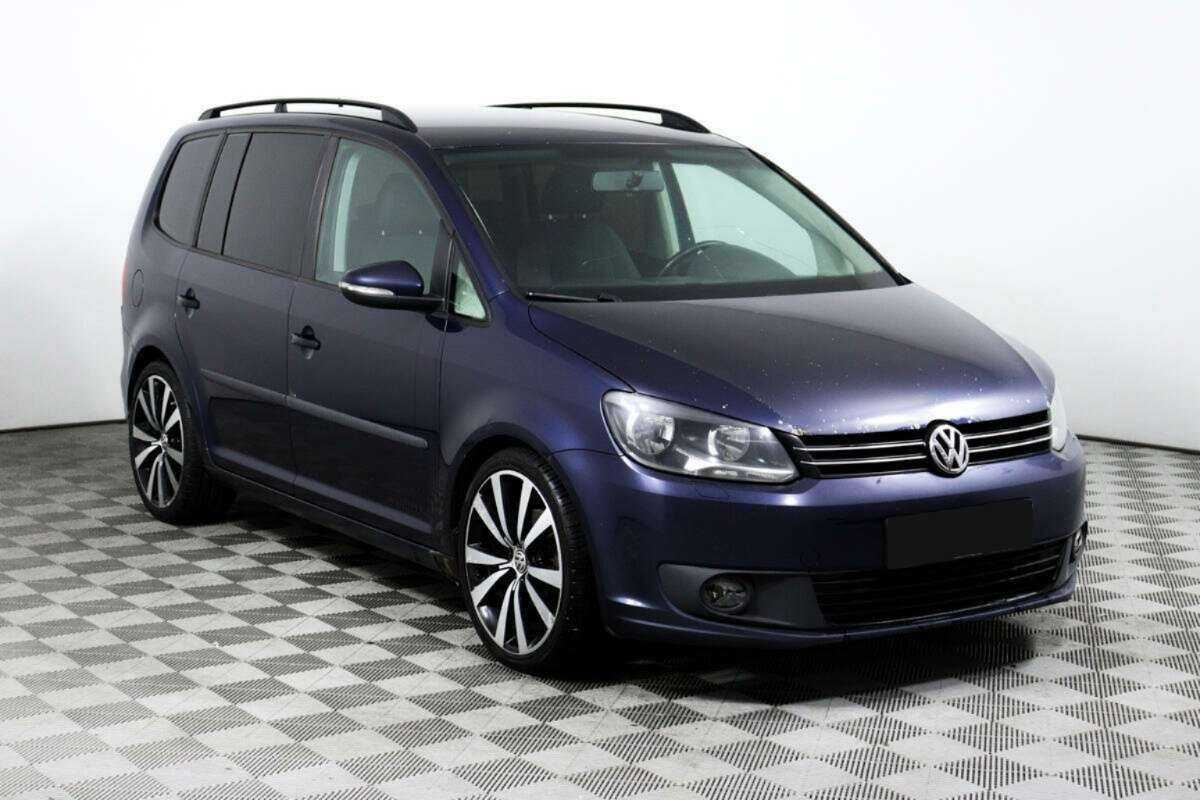 Volkswagen Touran с пробегом — 2012 год. Фото: #2