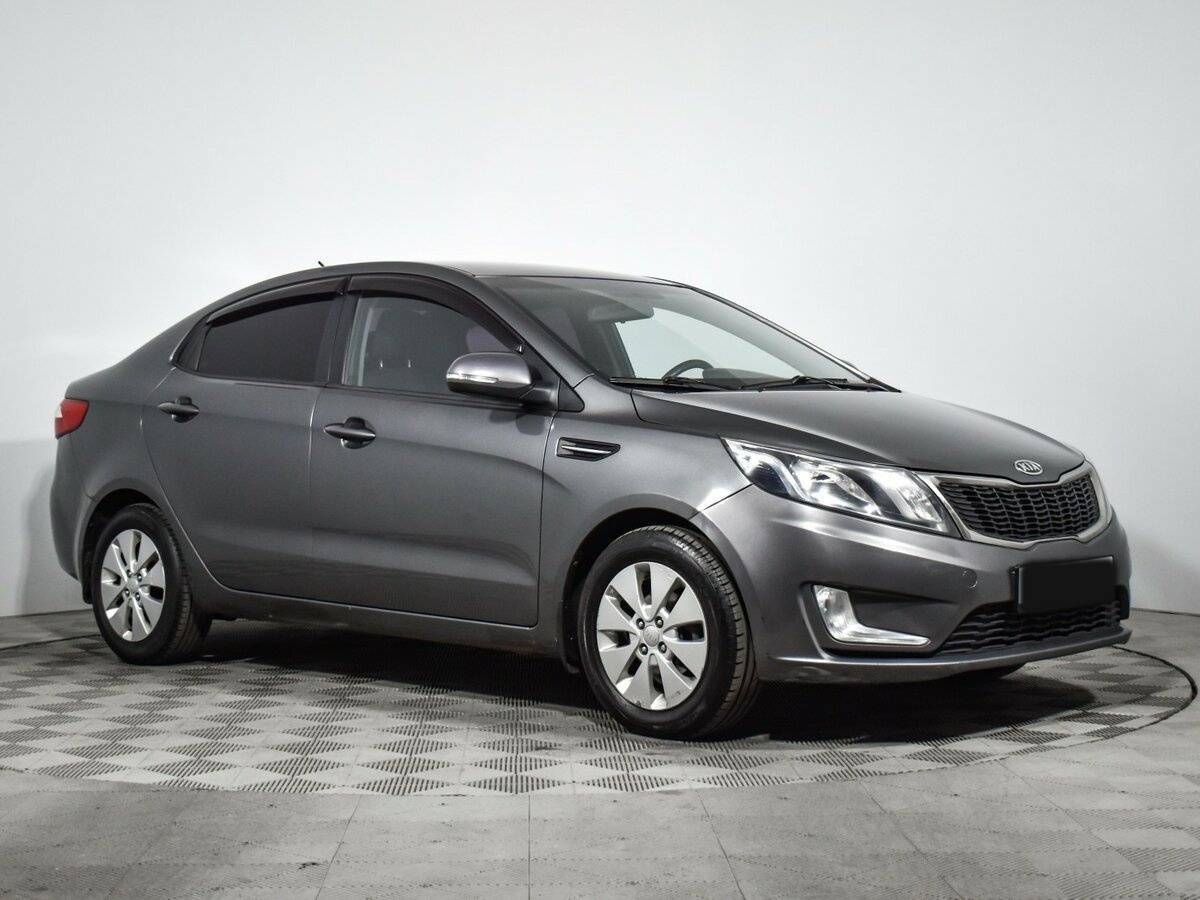 Kia Rio с пробегом — 2011 год. Фото: #2