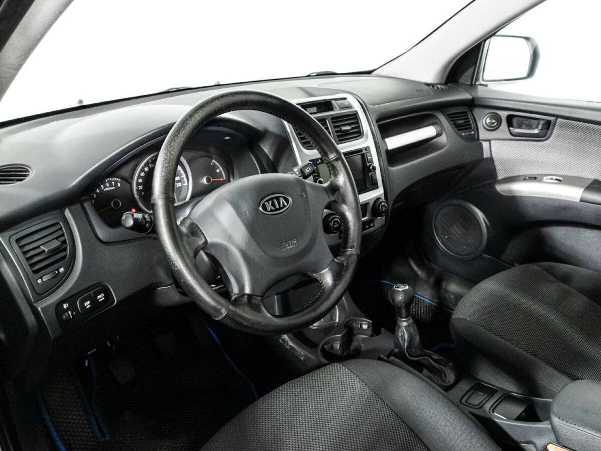 Kia Sportage с пробегом — 2010 год. Фото: #10