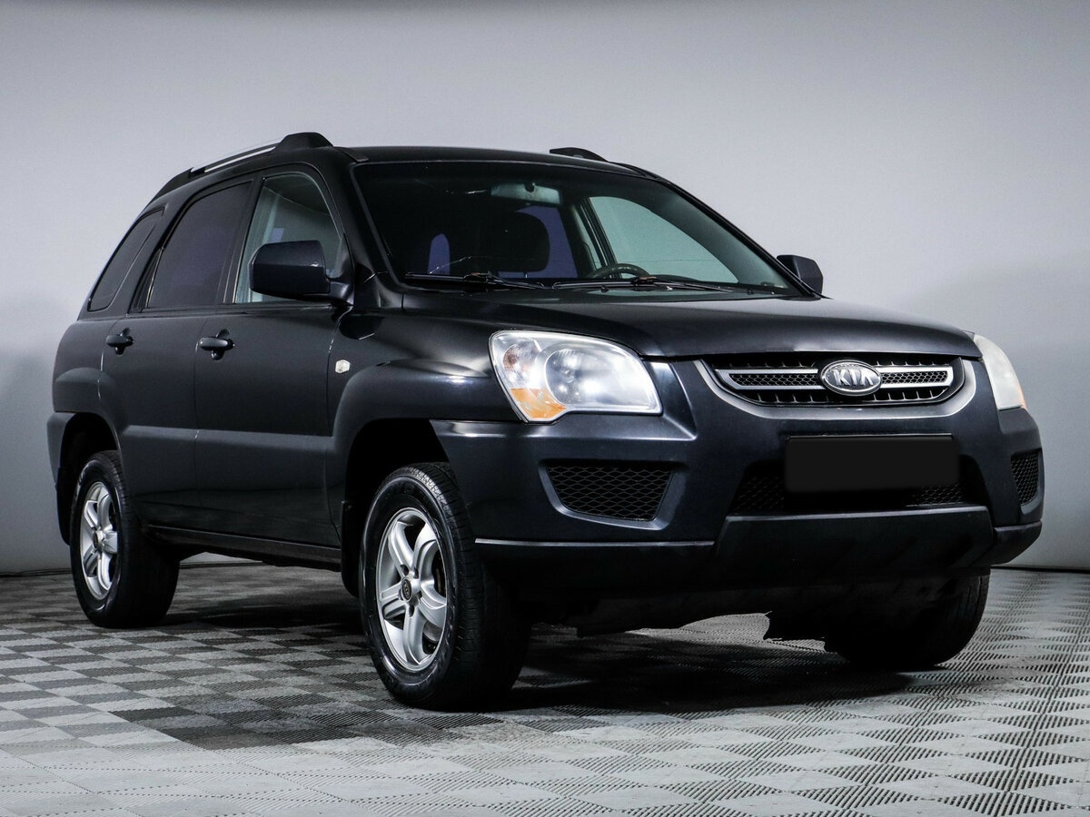 Kia Sportage с пробегом — 2009 год. Фото: #2