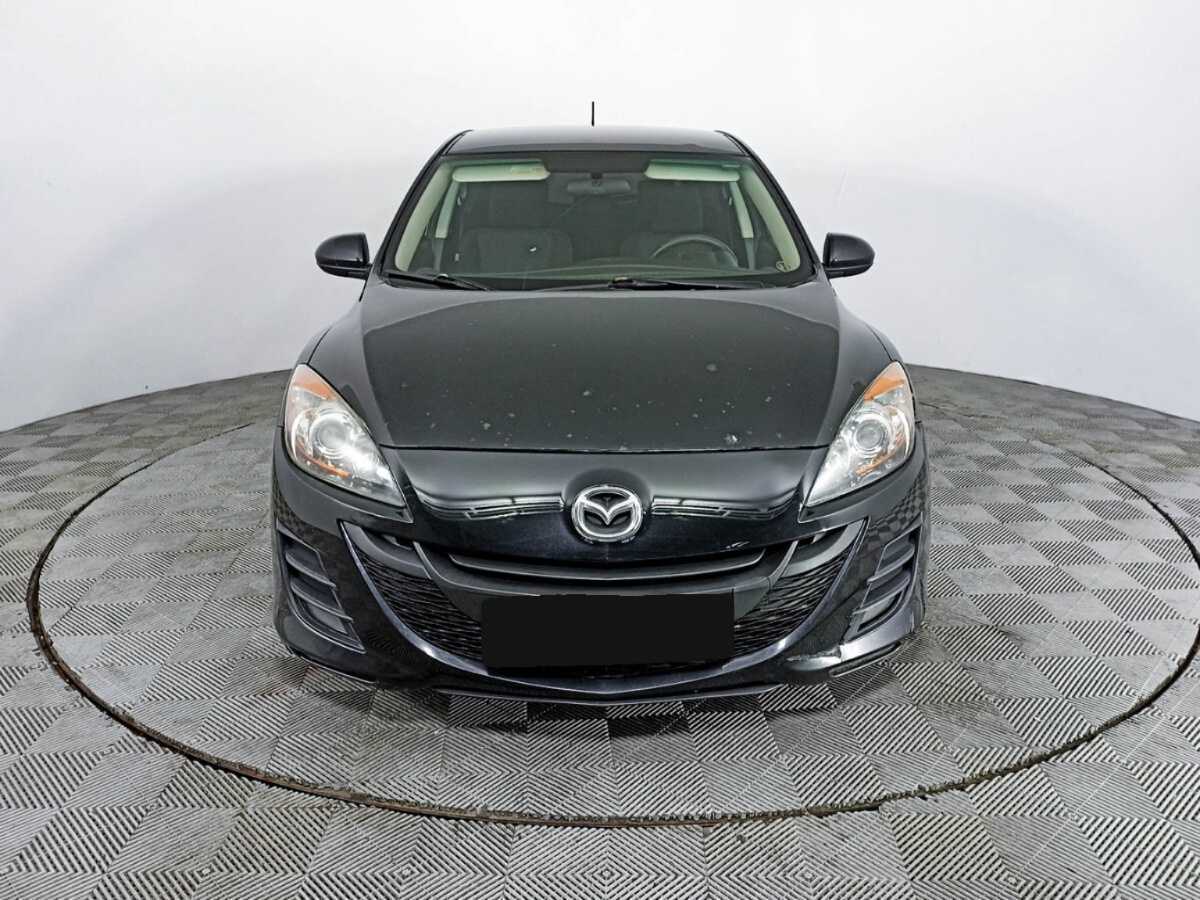 Mazda 3 с пробегом — 2010 год. Фото: #1