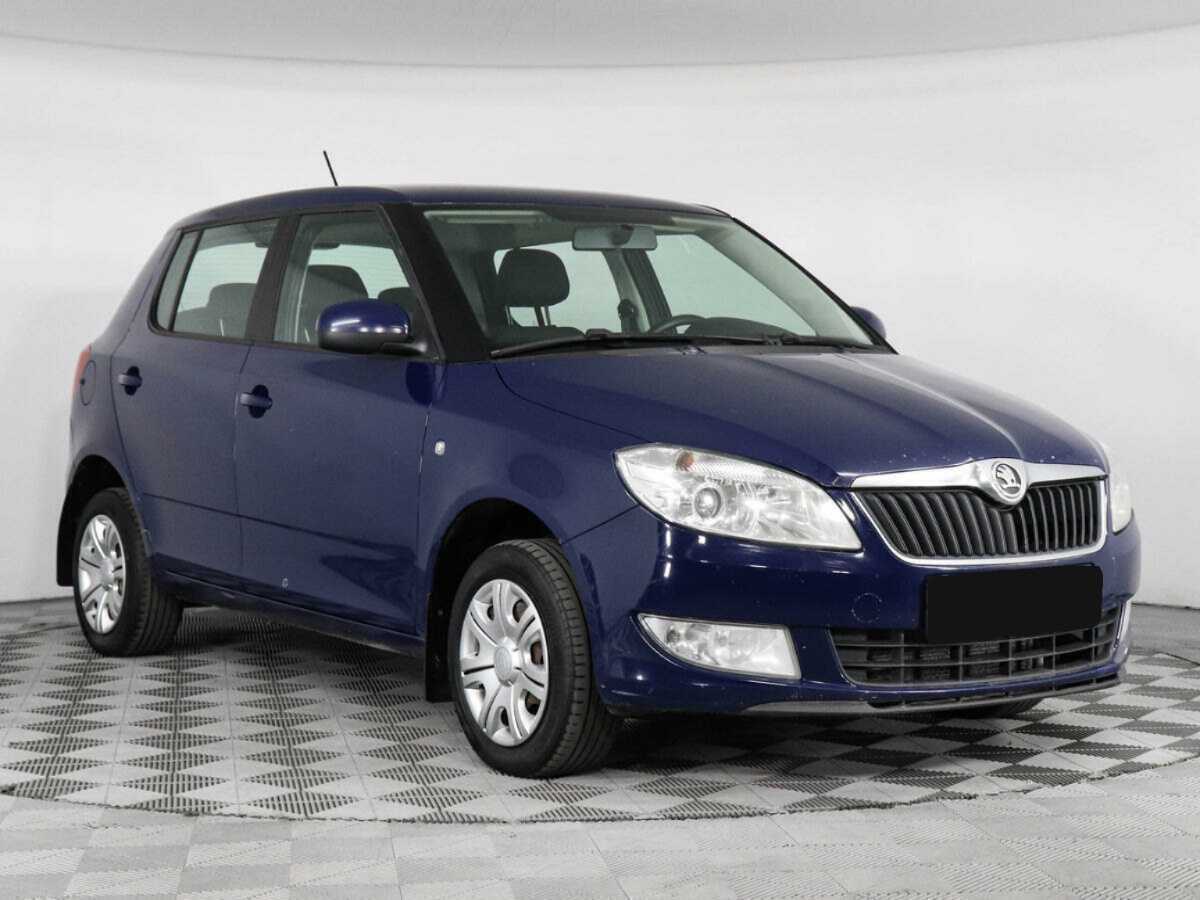 Skoda Fabia с пробегом — 2013 год. Фото: #1