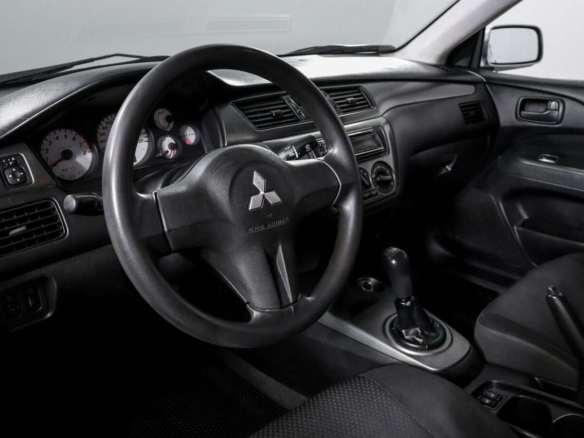 Mitsubishi Lancer с пробегом — 2007 год. Фото: #10