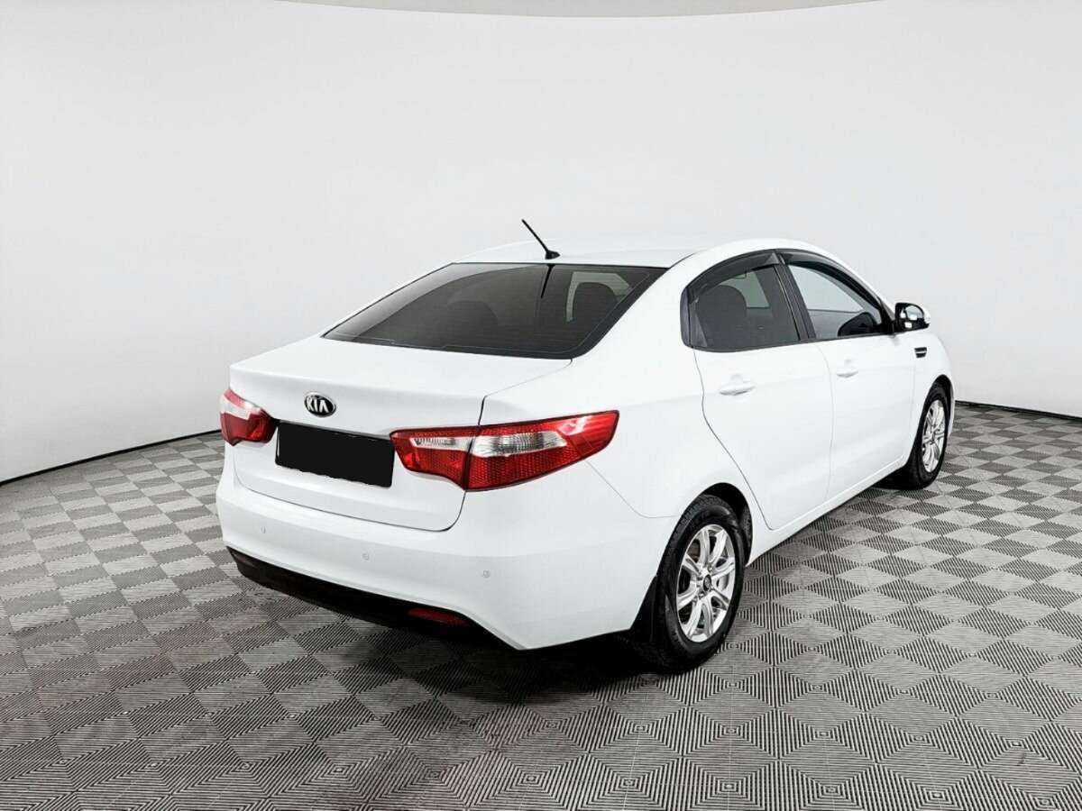 Kia Rio с пробегом — 2013 год. Фото: #4
