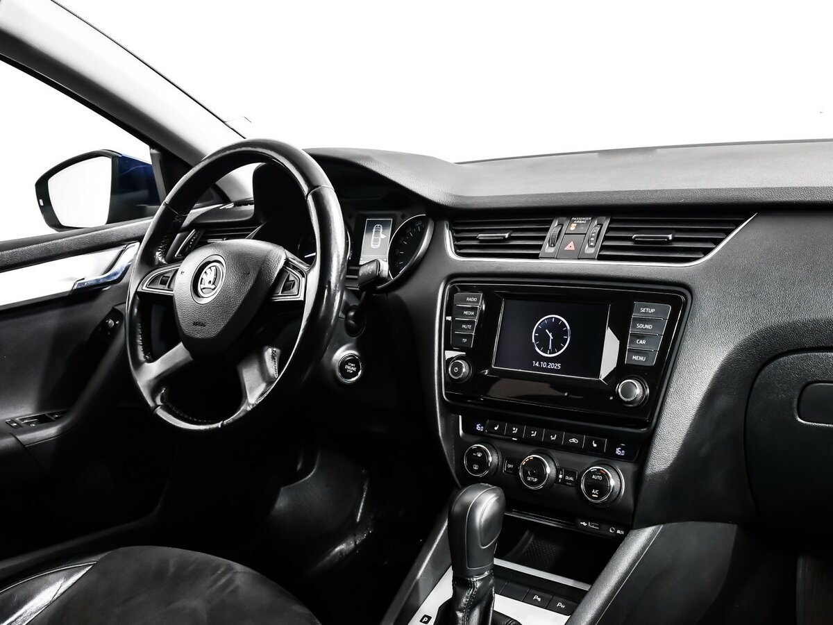 Skoda Octavia с пробегом — 2014 год. Фото: #6
