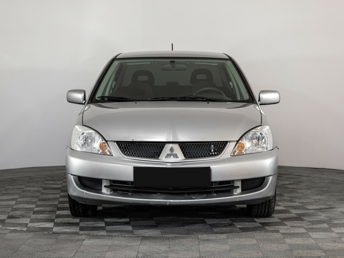 Mitsubishi Lancer с пробегом — 2006 год. Фото: #1