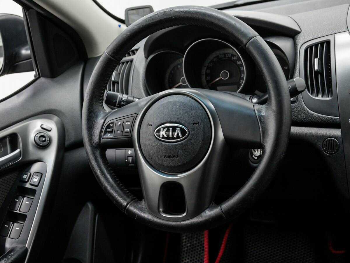 Kia Cerato с пробегом — 2011 год. Фото: #11