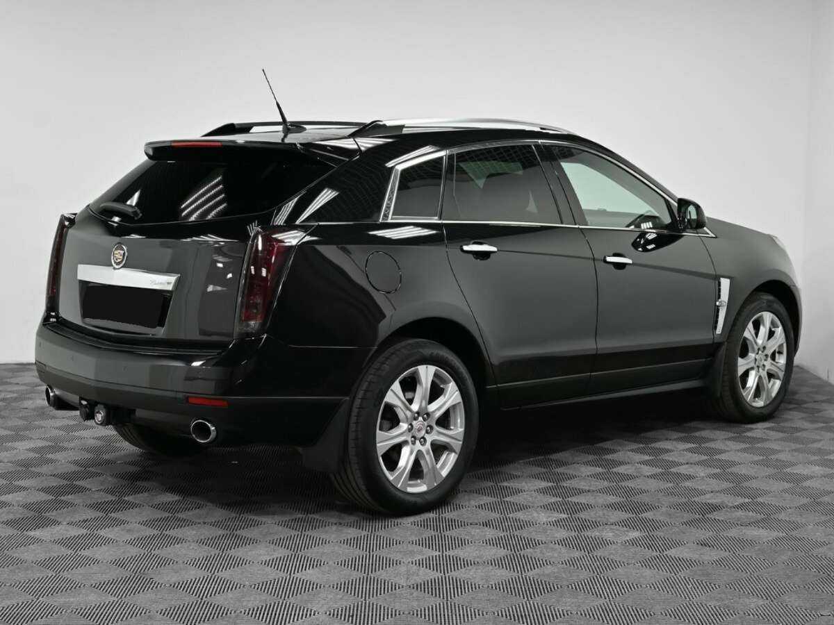Cadillac SRX с пробегом — 2010 год. Фото: #1