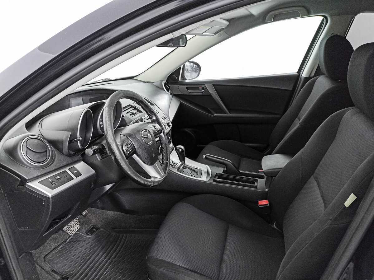 Mazda 3 с пробегом — 2010 год. Фото: #12