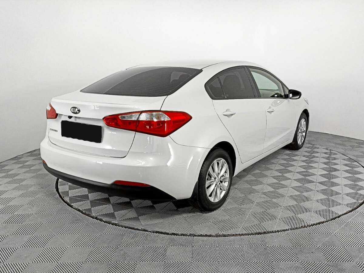 Kia Cerato с пробегом — 2014 год. Фото: #4