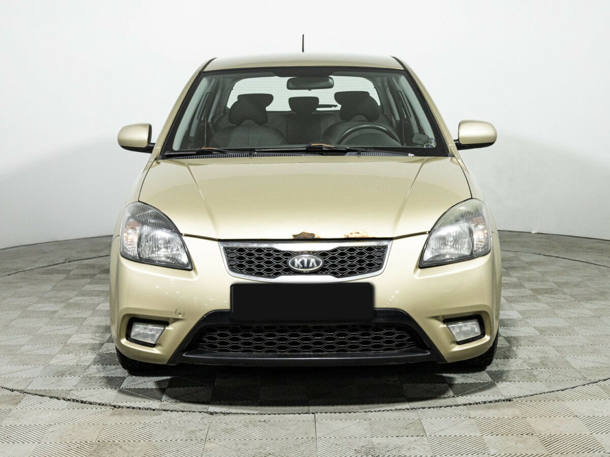 Kia Rio с пробегом — 2011 год. Фото: #1