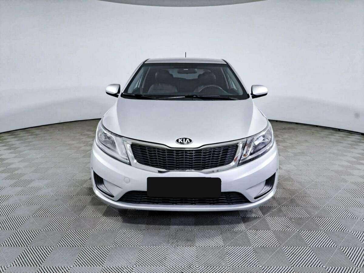 Kia Rio с пробегом — 2013 год. Фото: #1