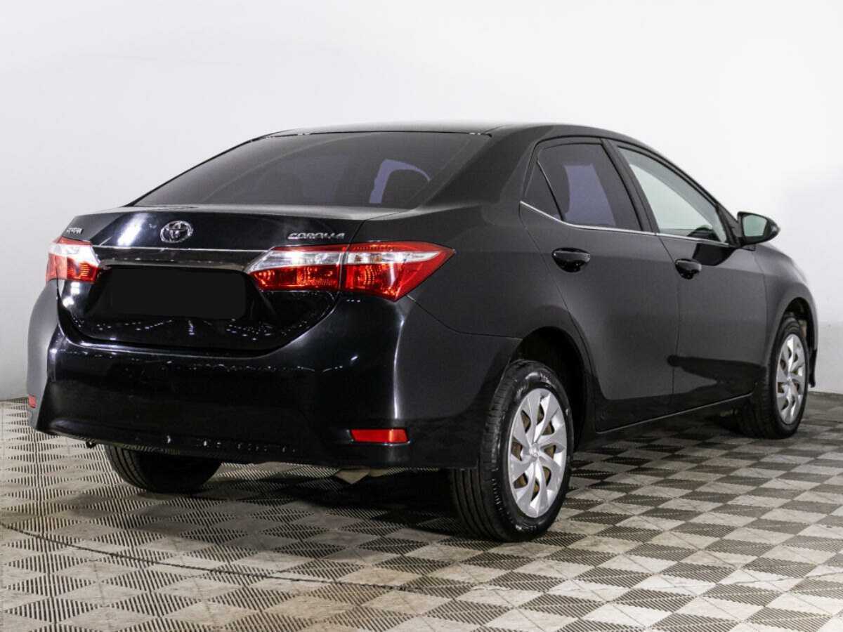 Toyota Corolla с пробегом — 2013 год. Фото: #4