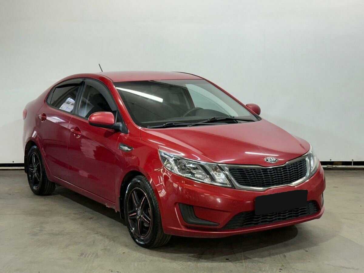 Kia Rio с пробегом — 2013 год. Фото: #2