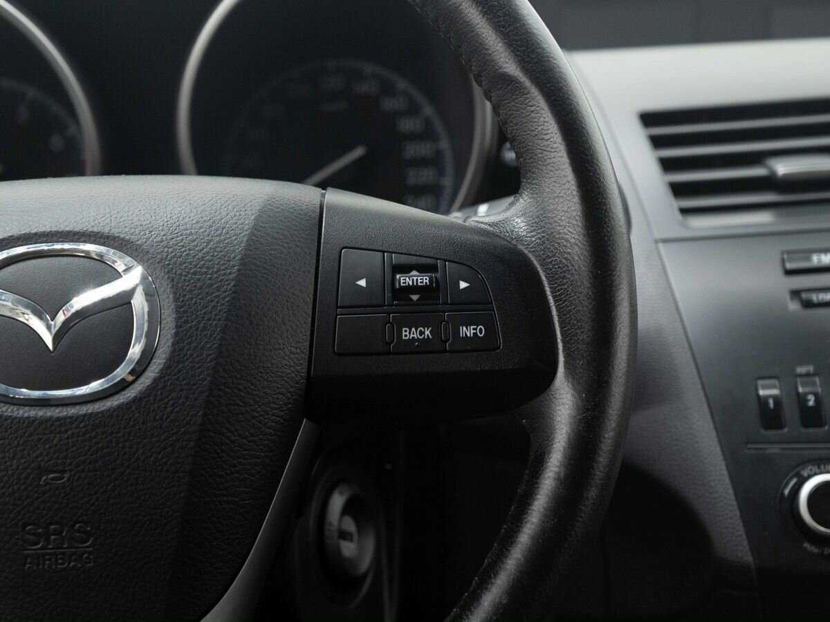 Mazda 3 с пробегом — 2012 год. Фото: #16