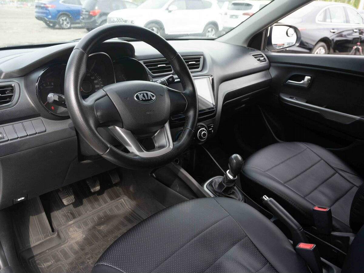 Kia Rio с пробегом — 2014 год. Фото: #6