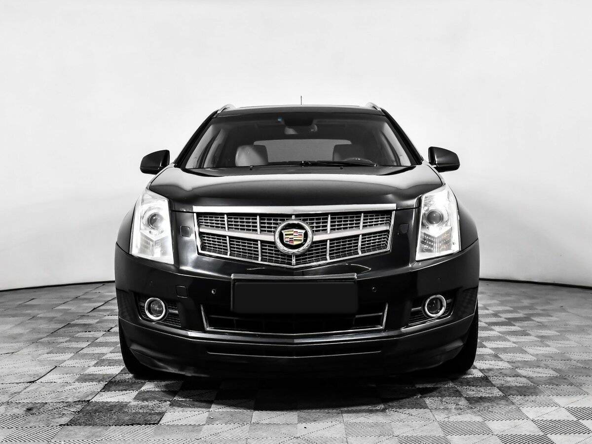 Cadillac SRX с пробегом — 2011 год. Фото: #1