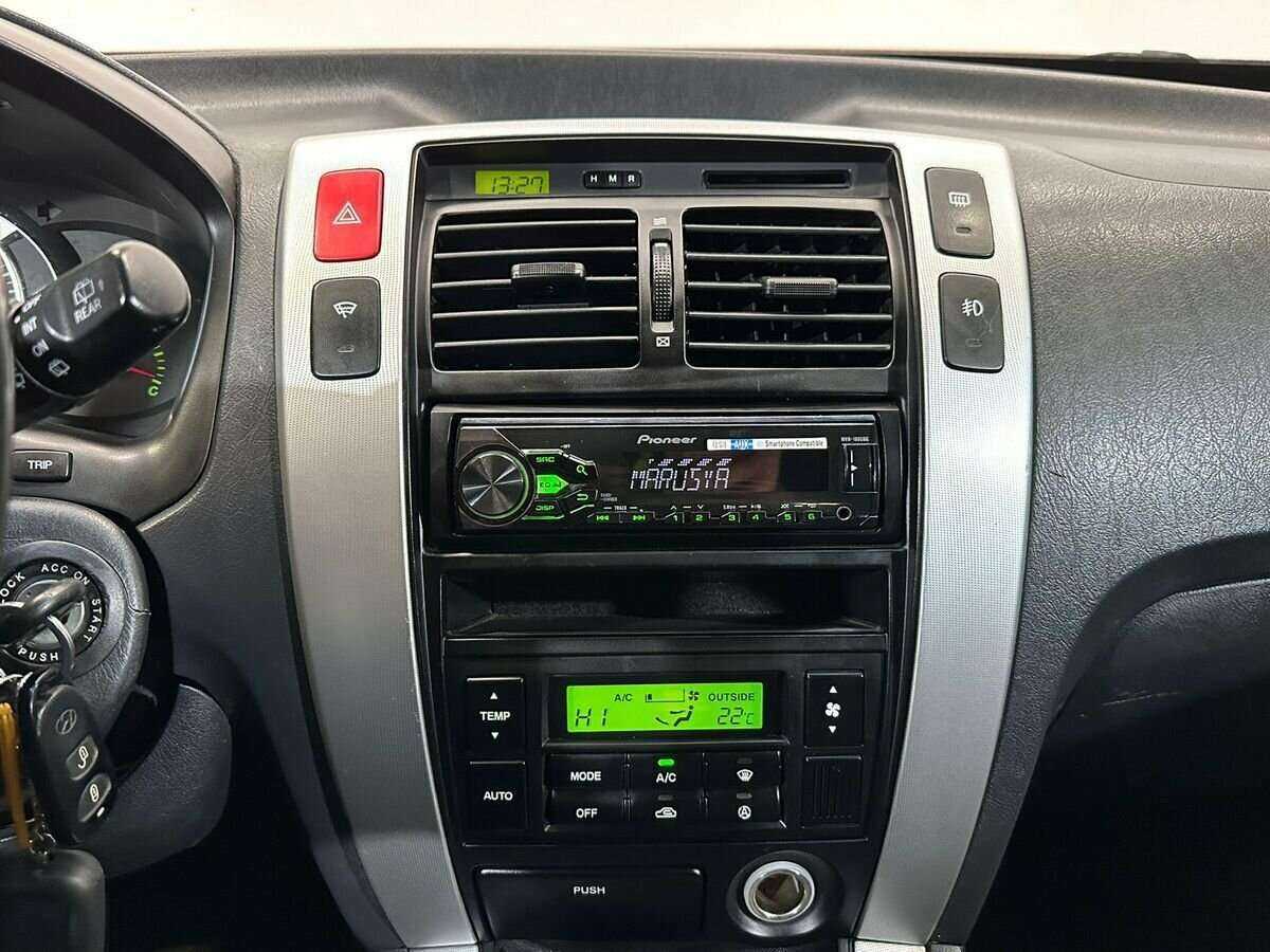 Hyundai Tucson с пробегом — 2007 год. Фото: #13