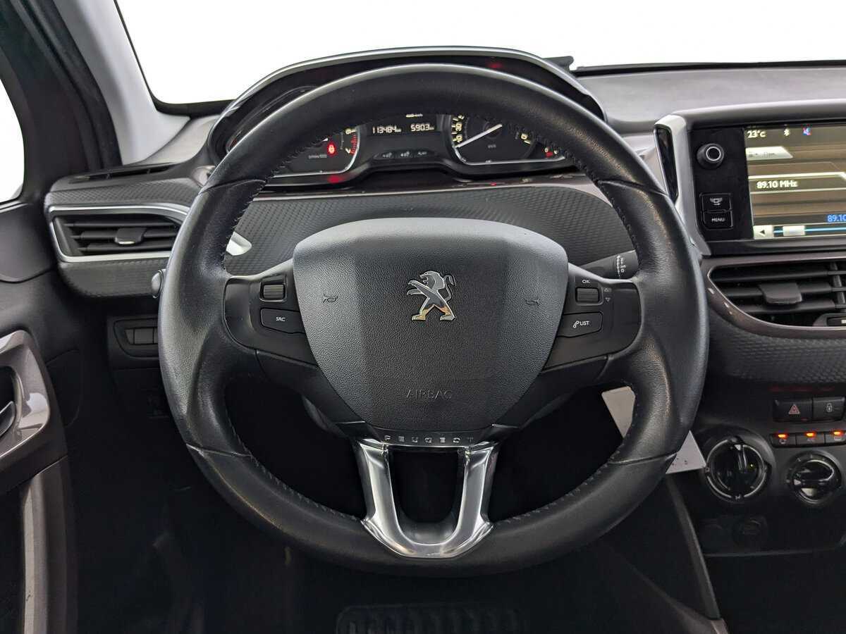 Peugeot 2008 с пробегом — 2014 год. Фото: #21