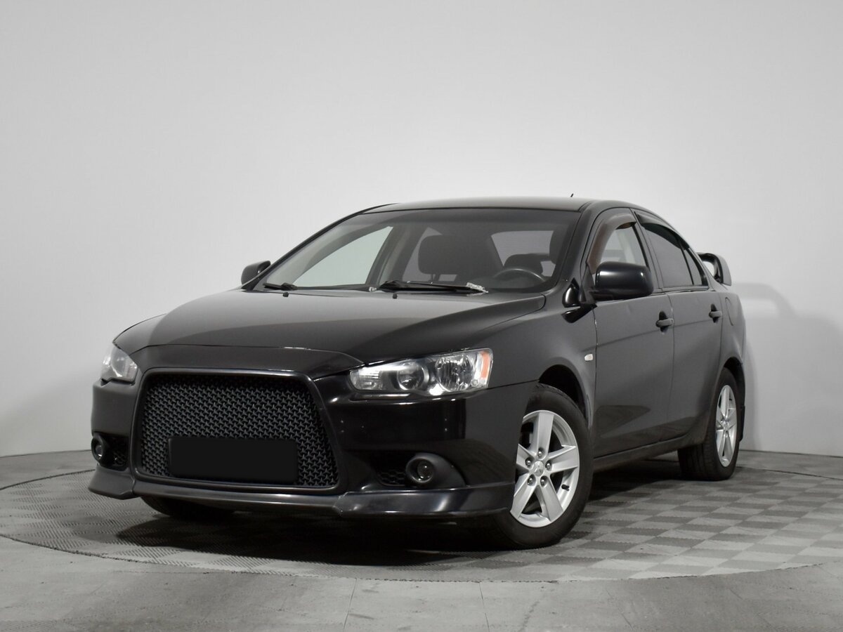 Mitsubishi Lancer с пробегом — 2011 год. Посмотреть фото