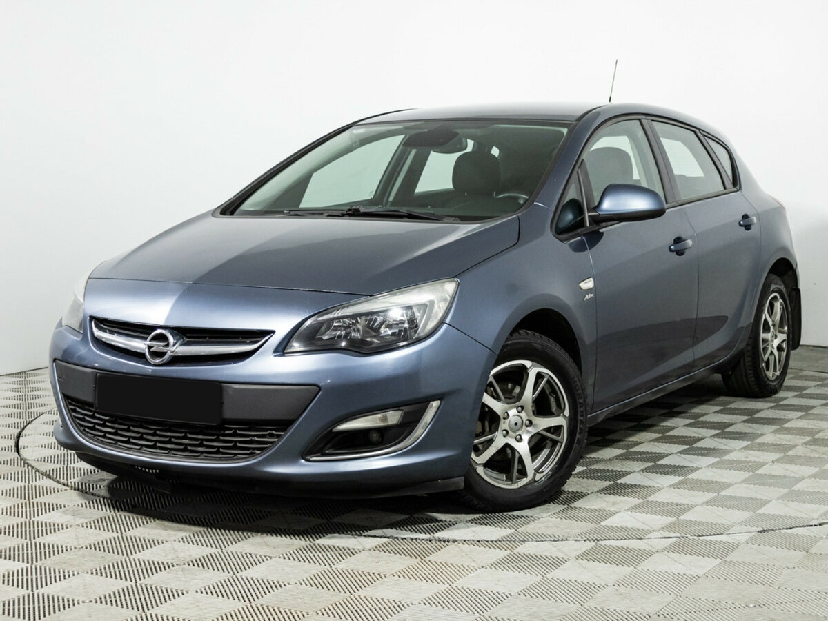 Opel Astra с пробегом — 2013 год. Фото: #0