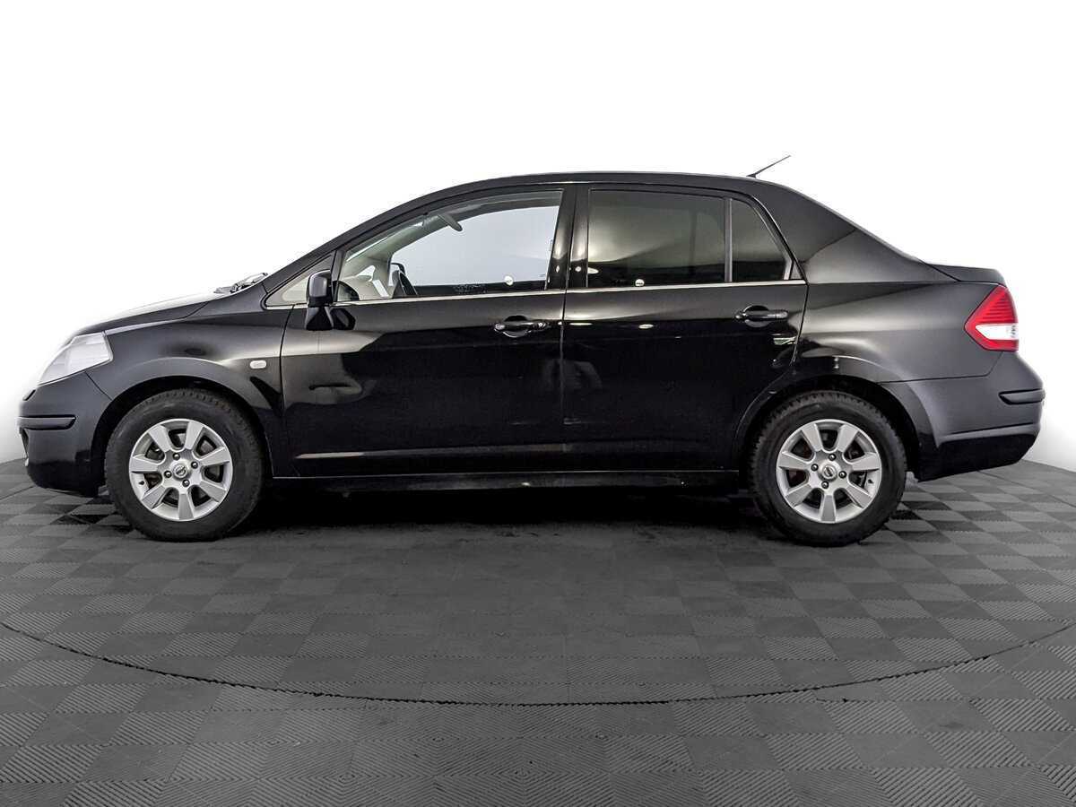 Nissan Tiida с пробегом — 2013 год. Фото: #7