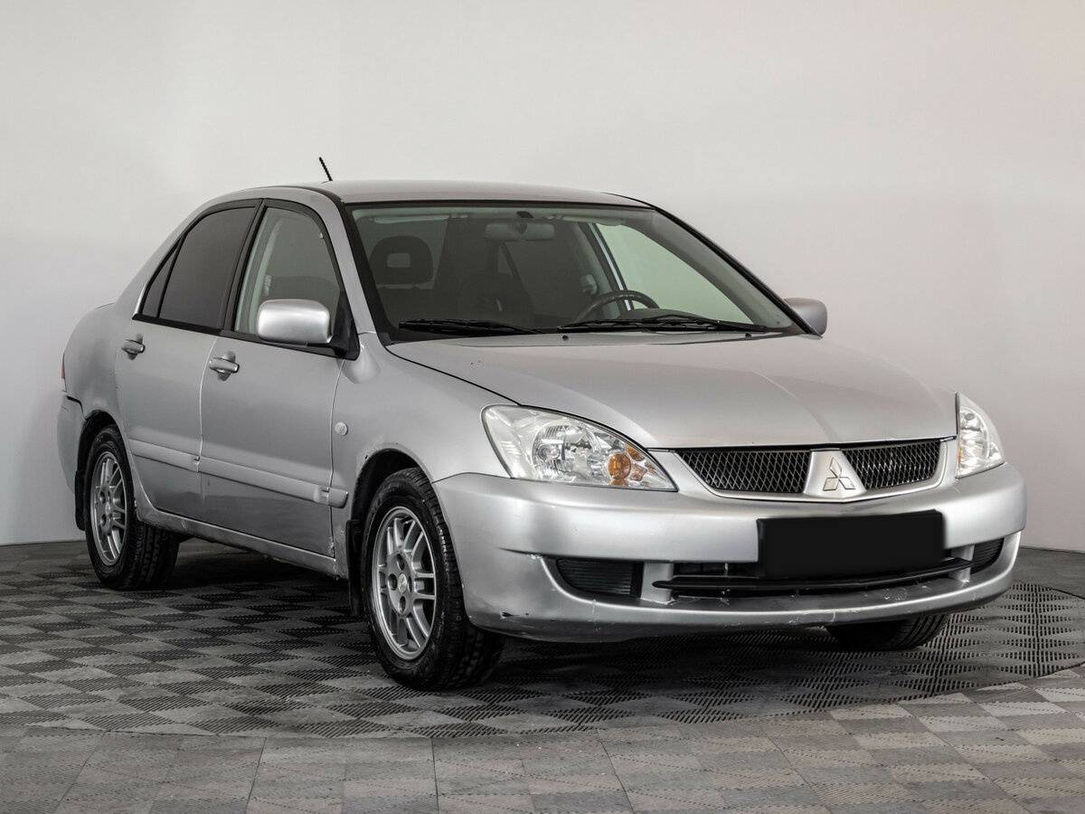 Mitsubishi Lancer с пробегом — 2006 год. Фото: #2