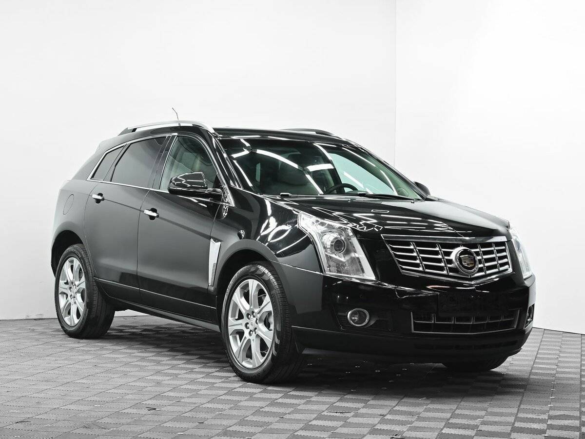 Cadillac SRX с пробегом — 2013 год. Фото: #1