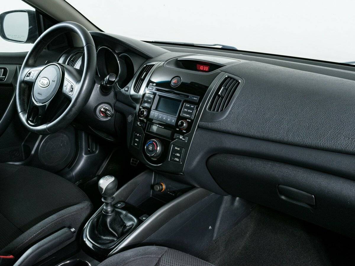 Kia Cerato с пробегом — 2012 год. Фото: #9