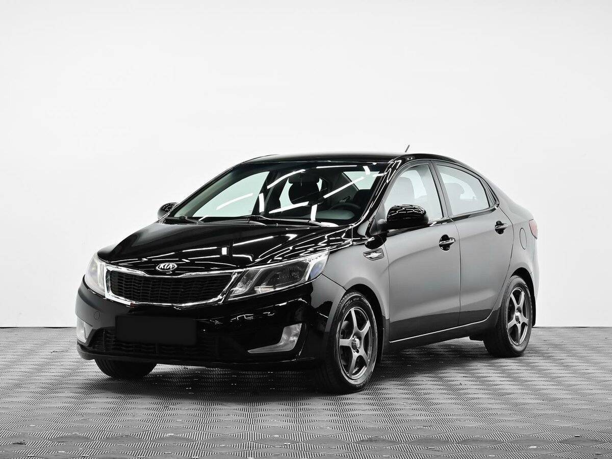 Kia Rio с пробегом — 2014 год. Фото: #0