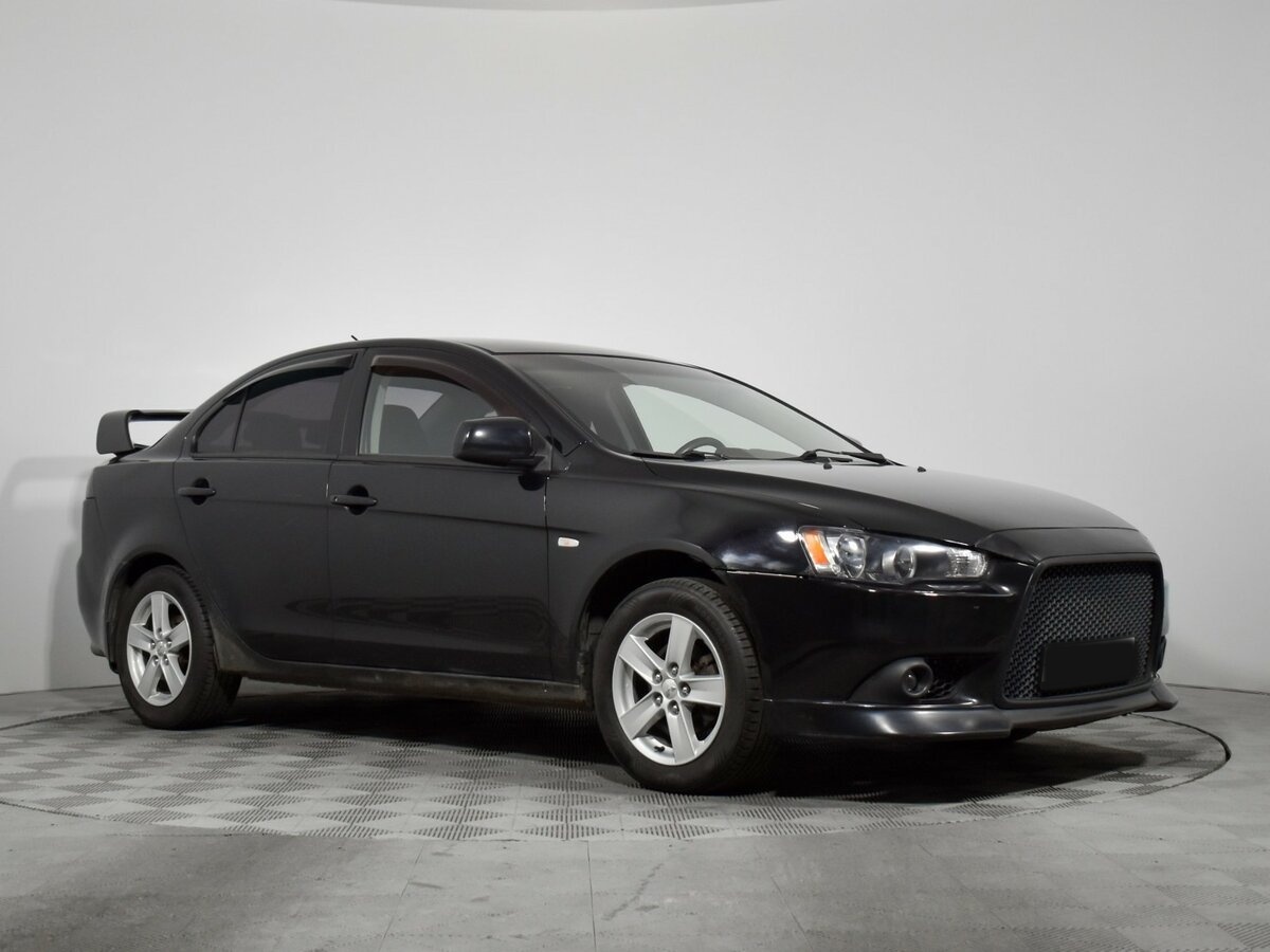 Mitsubishi Lancer с пробегом — 2011 год. Фото: #2