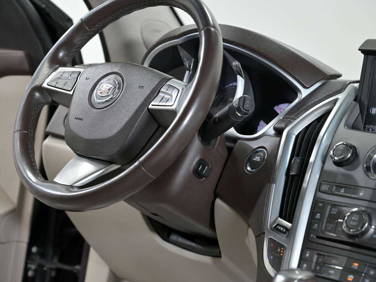 Cadillac SRX с пробегом — 2010 год. Фото: #11